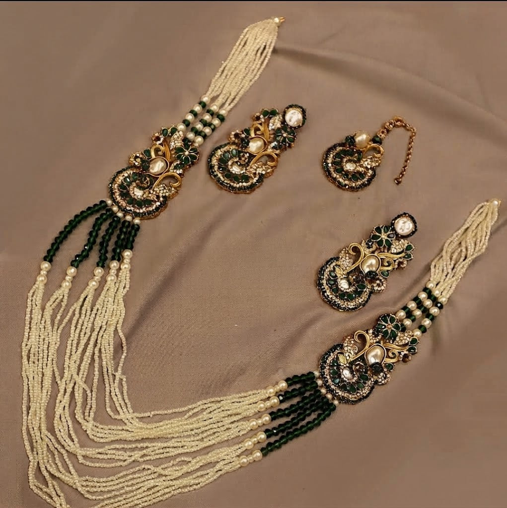 Exquisite Multi-Strand Pearl and Black Beaded Bridal Necklace Set with Matching Maang Tikka featuring racdo.pk